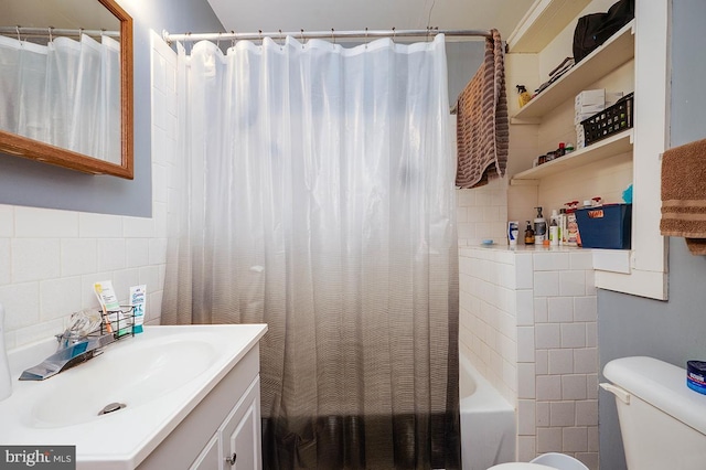 full bathroom with vanity, shower / bathtub combination with curtain, and toilet