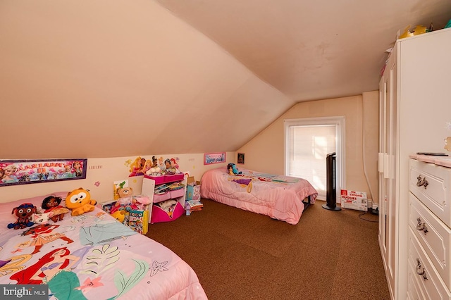 carpeted bedroom featuring vaulted ceiling