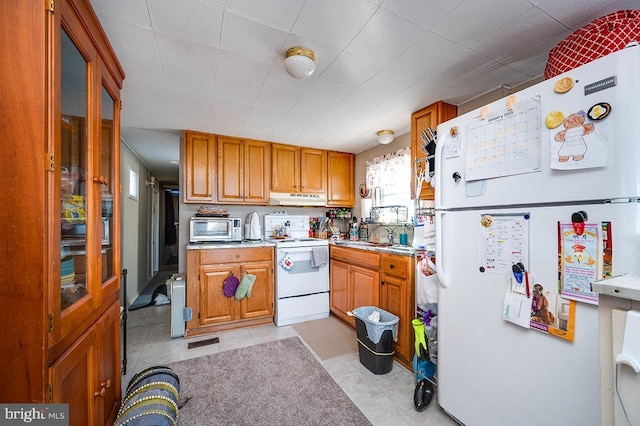 kitchen featuring white appliances