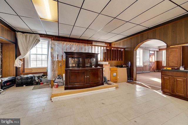 interior space featuring wood walls