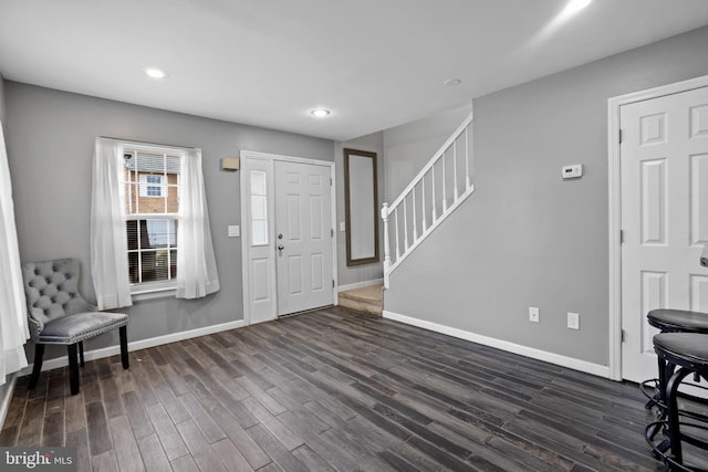 foyer featuring dark wood-type flooring