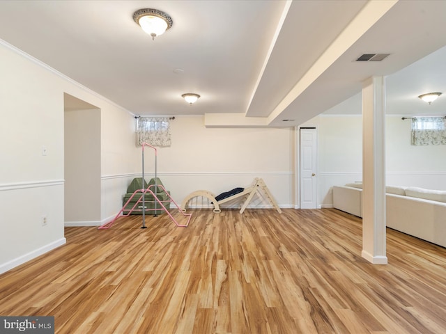 basement with light wood-type flooring