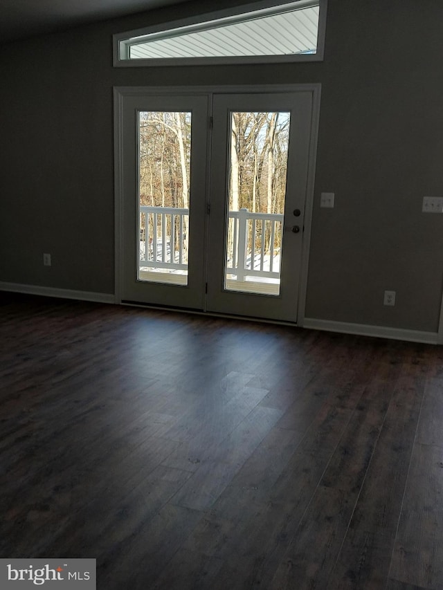 entryway with dark hardwood / wood-style floors