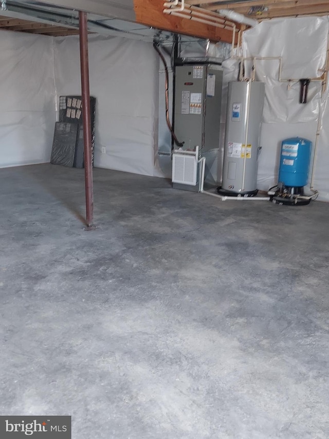 basement featuring electric water heater