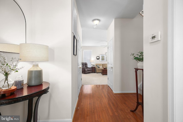 corridor with dark wood-type flooring