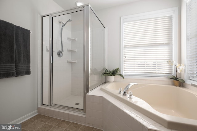 bathroom featuring separate shower and tub and tile patterned flooring