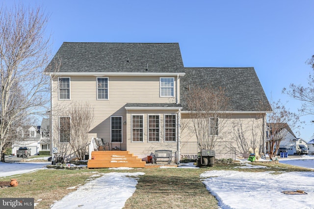 view of snow covered property