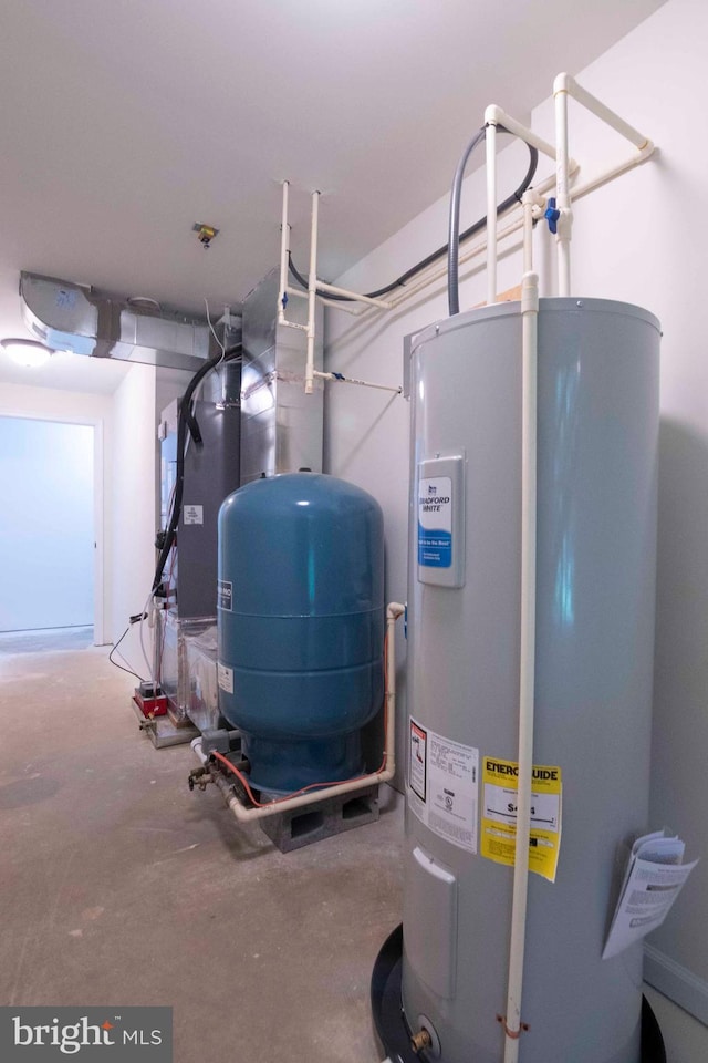 utility room with electric water heater