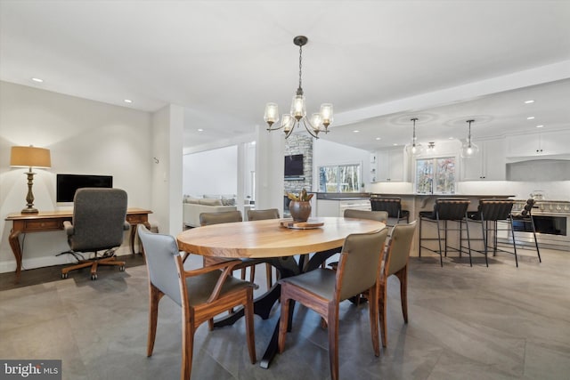 dining room with a chandelier