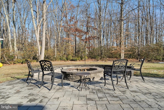 view of patio featuring a fire pit