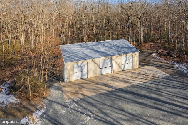 view of outbuilding featuring a garage