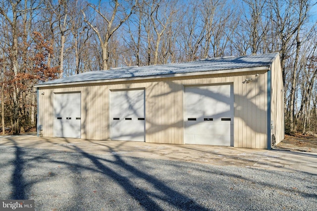 view of outbuilding featuring a garage