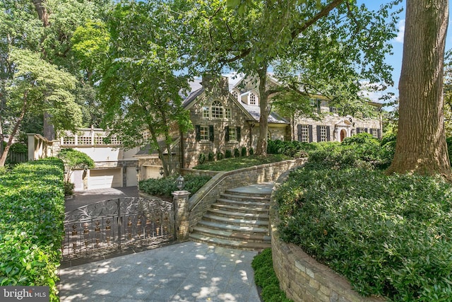 view of front of property with a garage