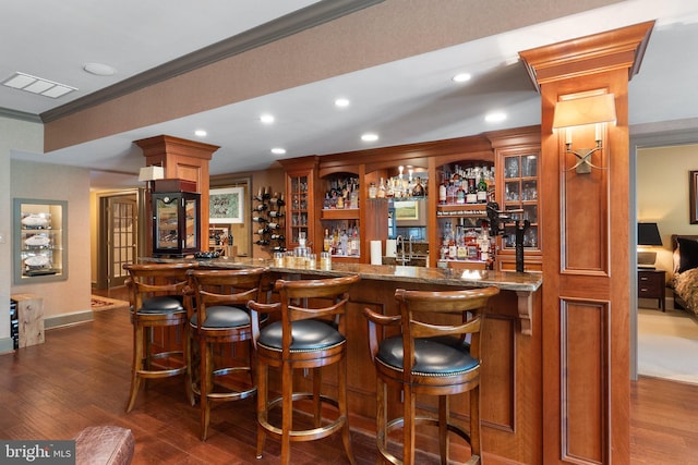 40959 Pacer Ln, Paeonian Springs, VA 20129 - bar featuring crown molding, recessed lighting, indoor wet bar, and dark wood-style flooring
