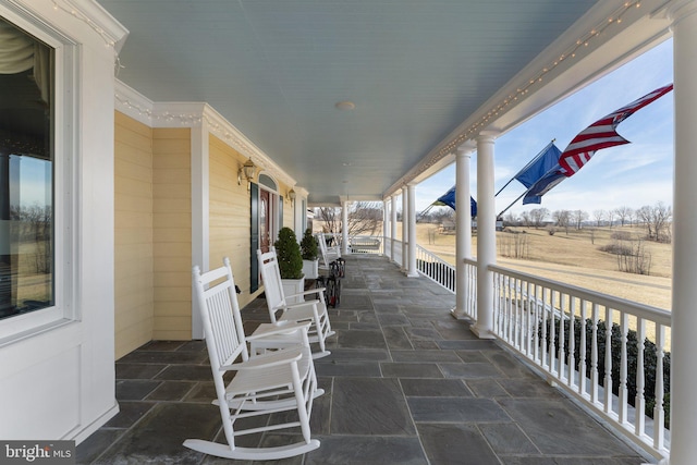 view of patio featuring covered porch