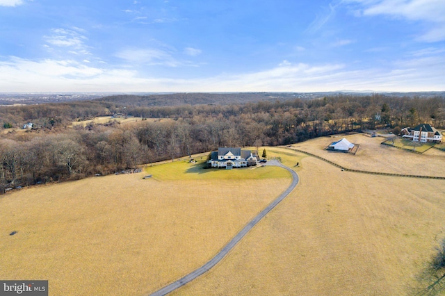 aerial view featuring a view of trees