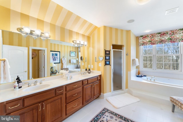 bathroom with visible vents, wallpapered walls, a garden tub, a stall shower, and a sink