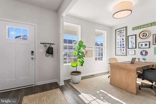 home office featuring dark hardwood / wood-style floors