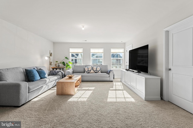 living room with light colored carpet