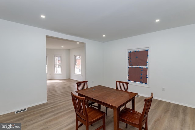 dining space featuring light hardwood / wood-style flooring