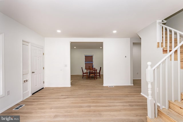 foyer with light hardwood / wood-style floors