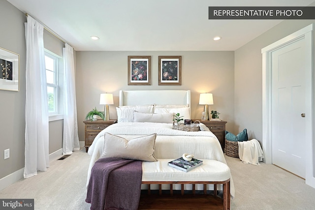 carpeted bedroom with recessed lighting and baseboards