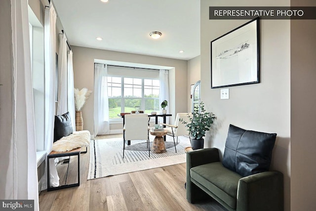 living area featuring recessed lighting and wood finished floors