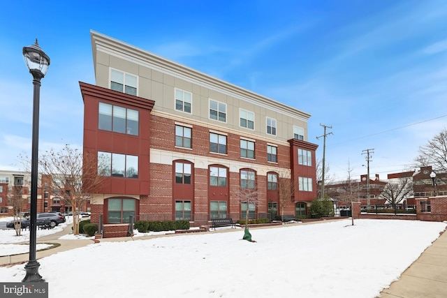 view of snow covered building