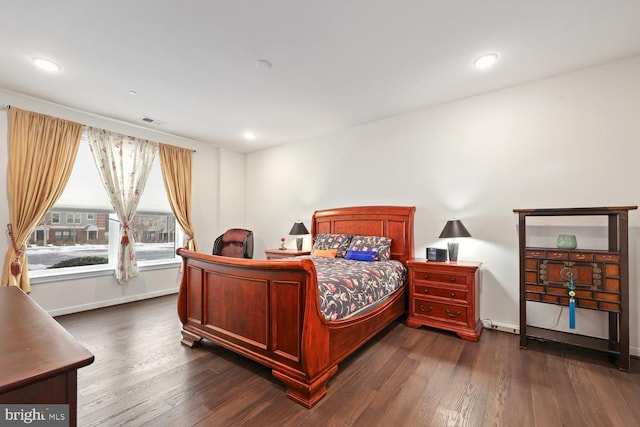 bedroom featuring dark hardwood / wood-style floors