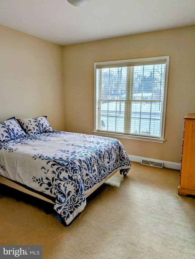 bedroom featuring carpet flooring