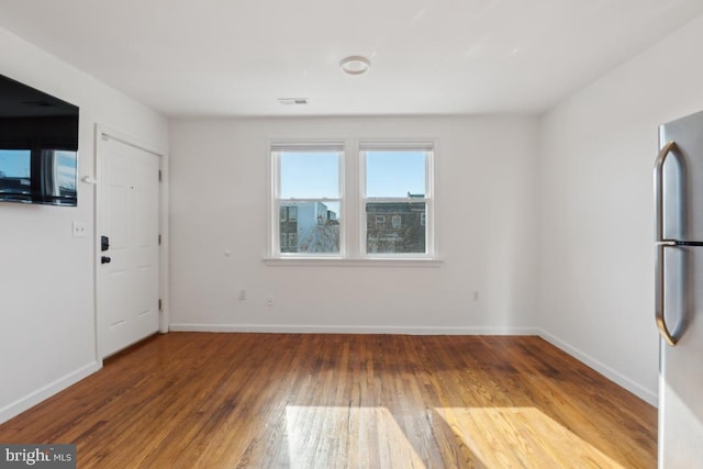 interior space with hardwood / wood-style flooring