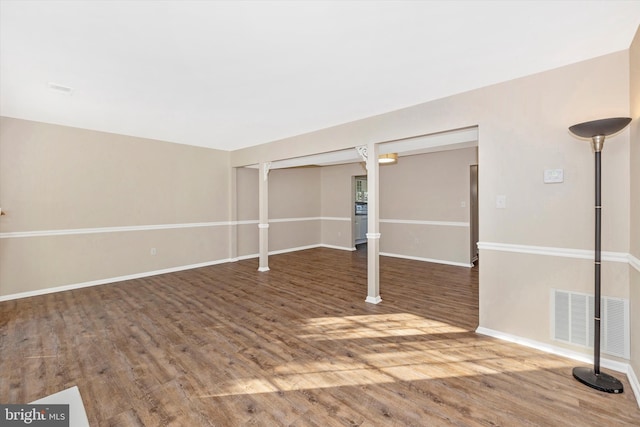 basement with wood-type flooring