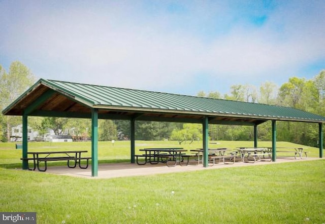 view of home's community with a gazebo and a lawn