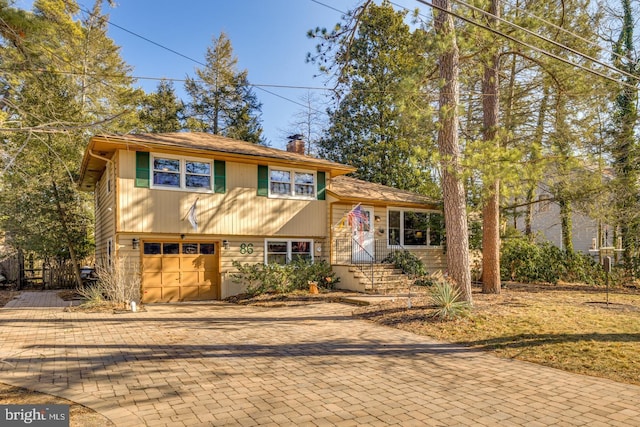 tri-level home featuring a garage