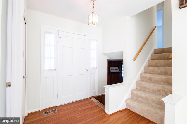 foyer with hardwood / wood-style flooring