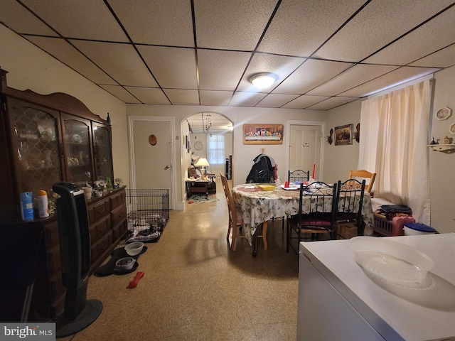 dining room with a paneled ceiling