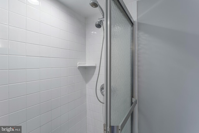 room details with a tile shower