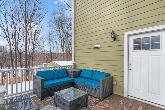 snow covered deck with an outdoor hangout area