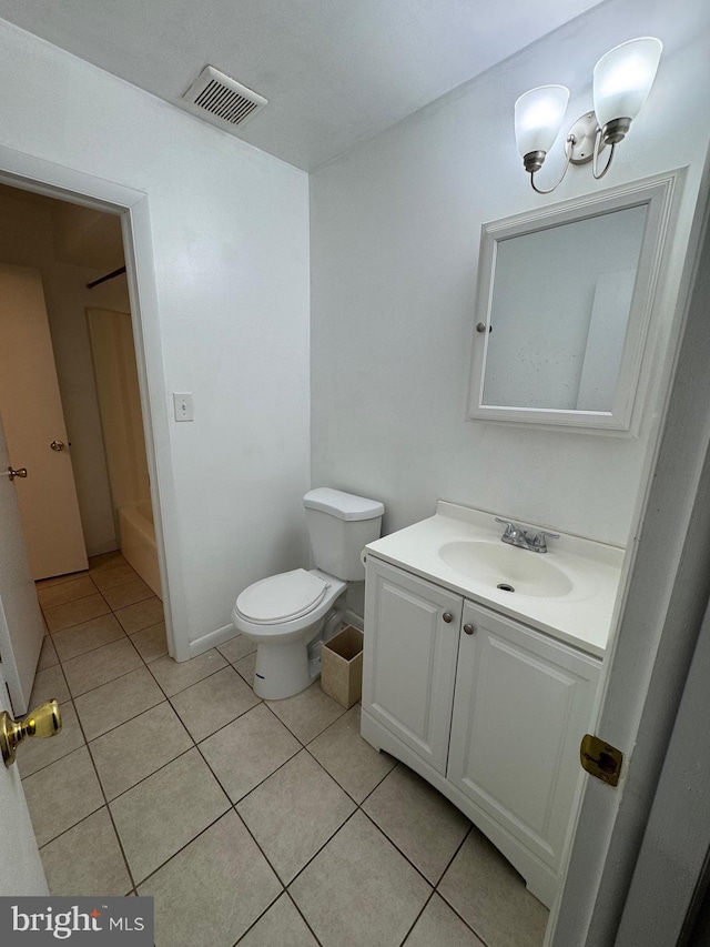 full bathroom with tile patterned floors, vanity,  shower combination, and toilet