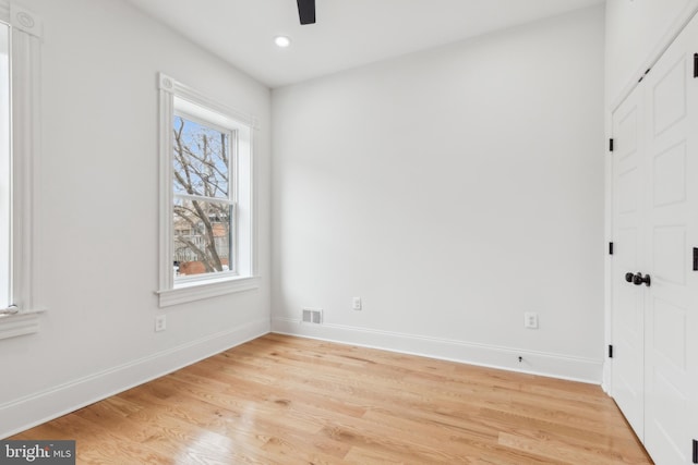 unfurnished room featuring light wood-type flooring