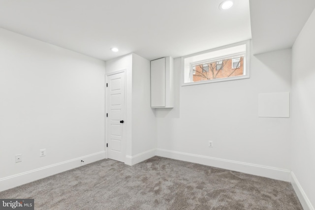 basement with light carpet