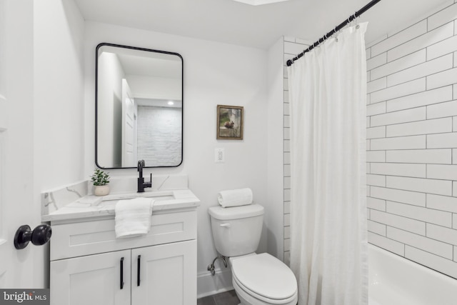 full bathroom featuring toilet, vanity, and shower / tub combo with curtain