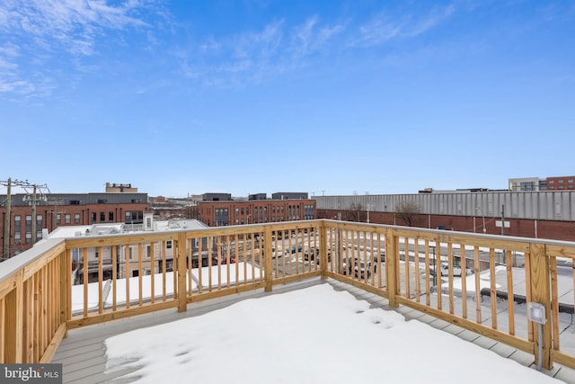 view of snow covered deck