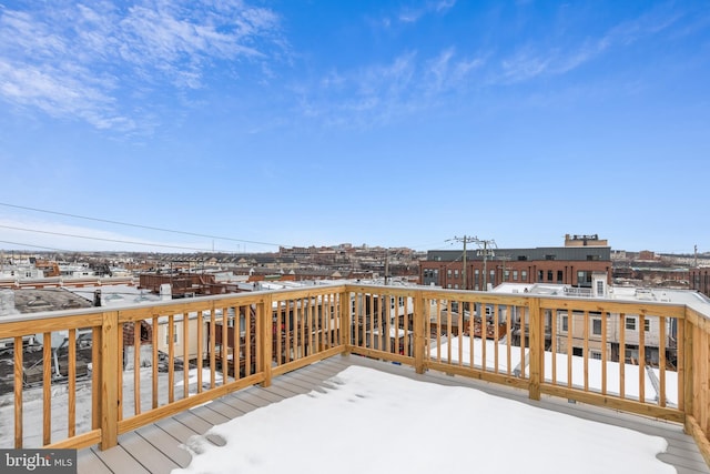 view of snow covered deck