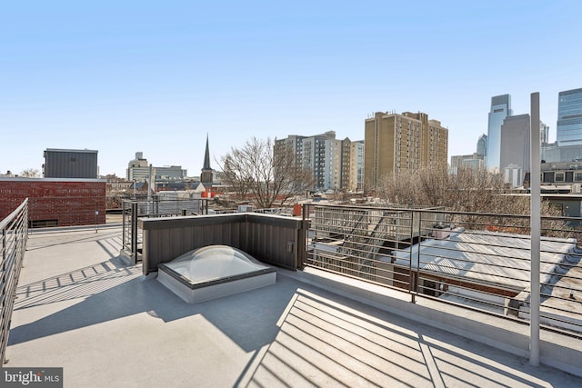 view of patio / terrace with a balcony