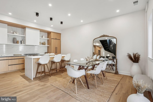 dining room featuring light wood-type flooring