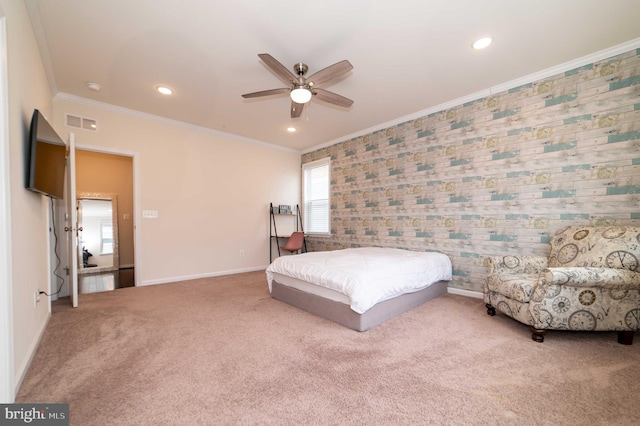 bedroom featuring carpet floors, ornamental molding, and ceiling fan