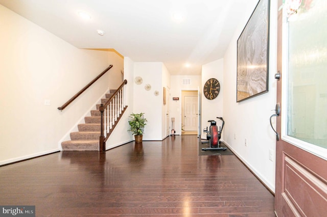 foyer featuring dark hardwood / wood-style floors