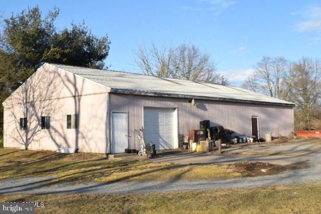 view of outdoor structure featuring a garage