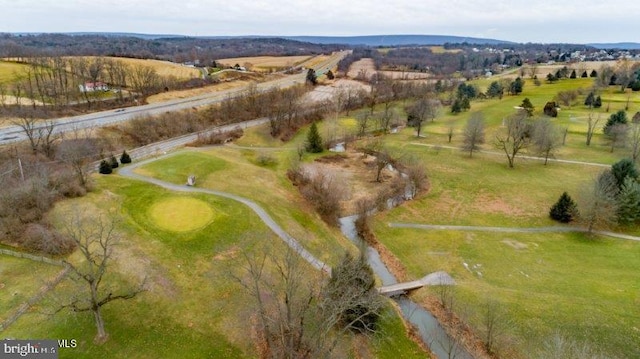 birds eye view of property featuring a rural view